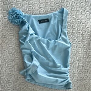 Light Blue Women's Top with Flower Detail